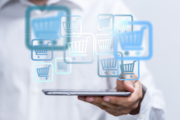 Shopping cart on digital tablet. Shopping online concept..