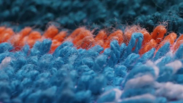 Microfiber texture with soft big pile. Side view texture of orange and blue large microfiber cloth