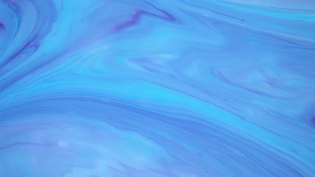 Abstract paint ink in motion. Psychedelic ebru background footage. Flowing colorful spots.