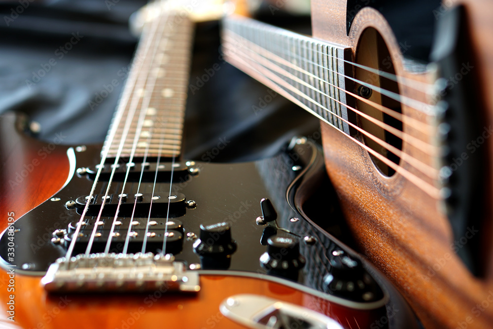 Wall mural Electric guitar and acoustic guitar, macro abstract