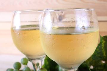 Grape and wine on table