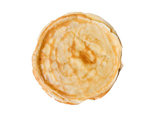 Pancakes lie on a white round plate on a wooden surface. View from above
