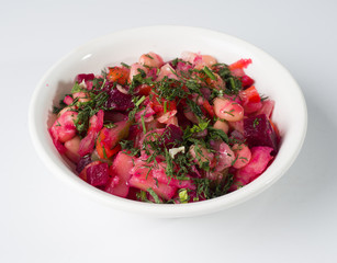 Russian beetroot salad Vinigret in a bowl. Side view