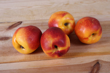 Nectarines on table