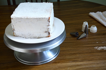 square cake with white icing