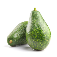 Green ripe avocado isolated on white background