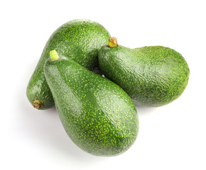 Green ripe avocado isolated on white background