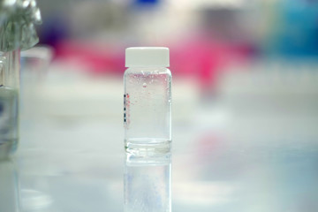 Soft focus of Scientific experiments in the lab,Experimental vaccine for disease treatment,Invented antiretroviral drugs