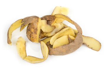 Potato peels in a bowl on a white background
