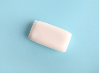 Natural soap on a blue background. Care and hygiene concept