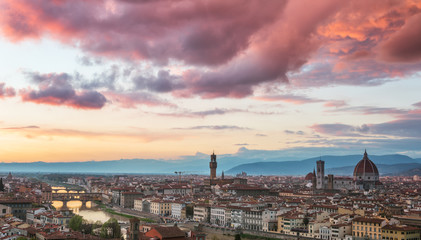 Fototapeta na wymiar Amazing colorful sunset view of Florence city, Italy with the river Arno and Cathedral of Santa Maria del Fiore.