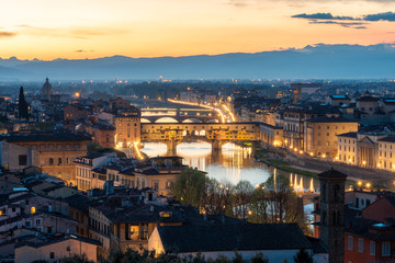 Fototapeta na wymiar Amazing panoramic night view of Florence city, Italy with the river Arno and Ponte Vecchio.