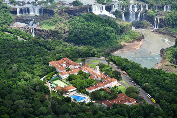 Fototapeta premium large river in the wild jungle and nature park from a helicopter