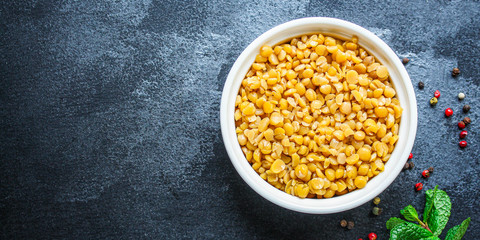 dry yellow peas boiled porridge healthy food (meat product sausage) menu concept background. top view. copy space for text