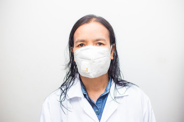 Elderly asian women wearing KN95 masks covering their mouths and noses preventing coronavirus and pm 2.5 dust on white background.