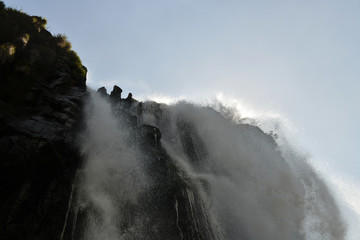 a trip to the roaring waterfalls on the river in a motor boat in a national park in brazil