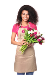 Young woman florist with tulips isolated on white background