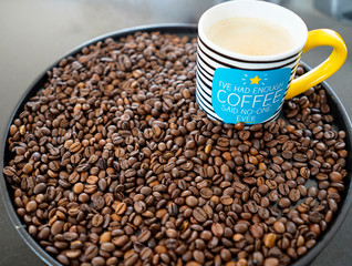 Cup of coffee and coffee beans 