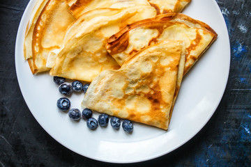 crepes Tasty dessert (thin pancakes, healthy breakfast) menu concept. background. top view. copy space for text