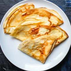 crepes Tasty dessert (thin pancakes, healthy breakfast) menu concept. background. top view. copy space for text