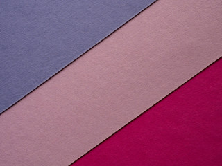 Fototapeta premium Colored sheets of paper. Pink and purple.