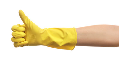 Hand in glove making gesture isolated on white background