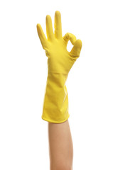 Hand in glove making gesture isolated on white background