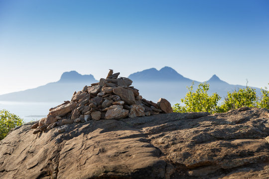 A cairn in the foreground of the island Landegode outside Bod&oslash; city.