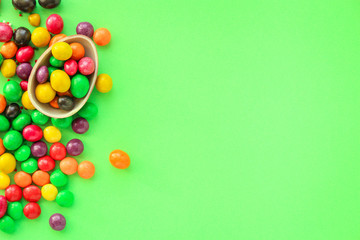 chocolate egg and candy easter decor, menu concept background. top view. copy space for text