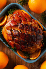 Whole baked ham. Cut thick skin. Marinated in oranges and honey. Top view.