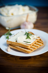 fried toast bread with garlic curd filling on a table