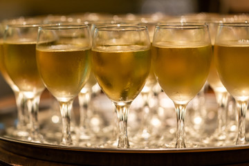 Table set with glasses, wine, alcohol and champagne for a celebration or a wedding