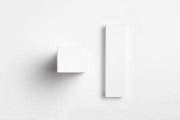 Blank packaging white Cardboard Paper Boxes  Mock up on white.Toothpaste package.High resolution...
