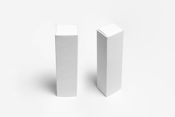 Blank packaging white Cardboard Paper Boxes  Mock up on white.Toothpaste package.High resolution photo.