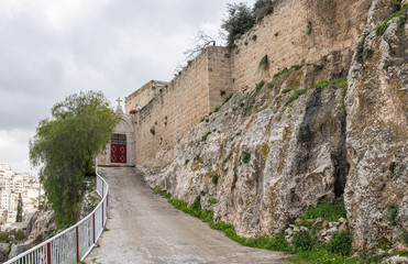 Fototapeta na wymiar The entrance to the Greek Akeldama Monastery in the old city of Jerusalem in Israel