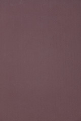 Painting dark red colour on concrete board background.