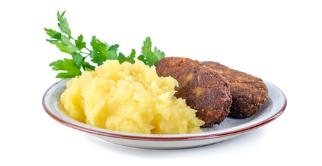 meatballs with mashed potatoes and parsley on a white background