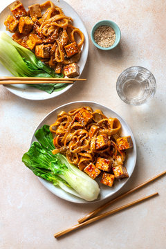 Teriyaki noodles with fried tofu and bok choi.