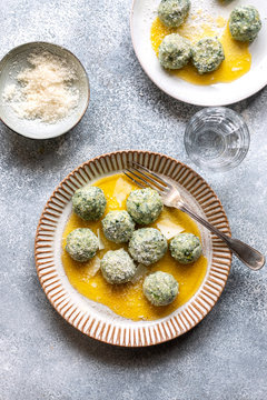 Spinach Ricotta Gnudi On A Plate.