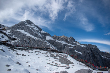 Close up of snow mountain with bright blue sky