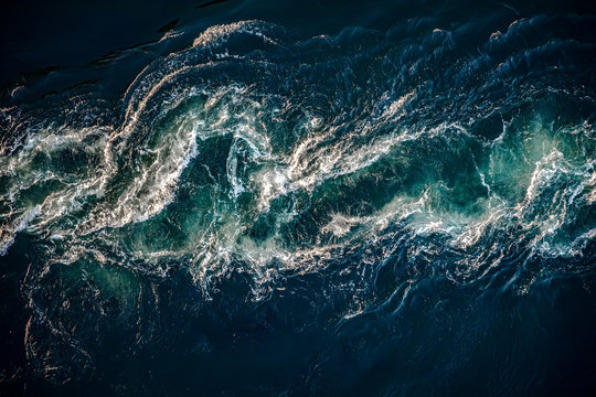 Waves Of Water Of The River And The Sea Meet Each Other During High Tide And Low Tide