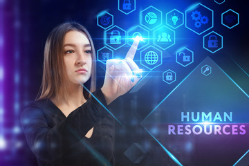Business, Technology, Internet and network concept. Young businessman working on a virtual screen of the future and sees the inscription: Human resources