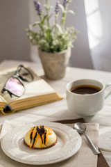 Obraz na płótnie Canvas Still life with coffee, cake and a bouquet of lavender