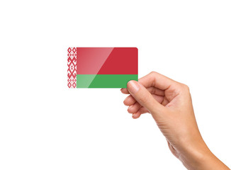 Beautiful hand holding Belarus flag card on white background