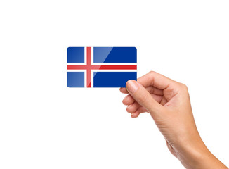 Beautiful hand holding Iceland flag card on white background