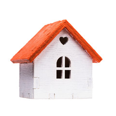 Obraz na płótnie Canvas Wooden toy house isolated on white background