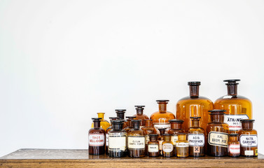 pharmacy bottles on wood board for interior decoration