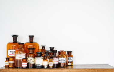 pharmacy bottles on wood board for interior decoration