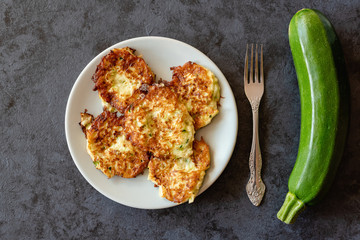 Crispy zucchini fritters with egg, flour and onion.