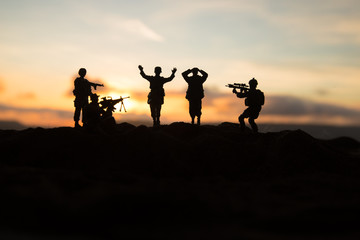 Battle scene. Military silhouettes fighting scene on war fog sky background. A German soldiers...
